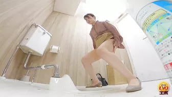 EE-746 01 Public toilet hidden camera: women jumping inside the toilet and popping the cork of urine champagne