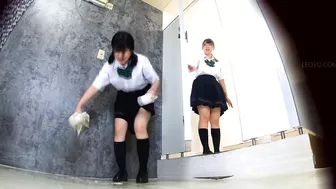 EE-747 05 Schoolgirls wetting themselves in front of the occupied toilet.